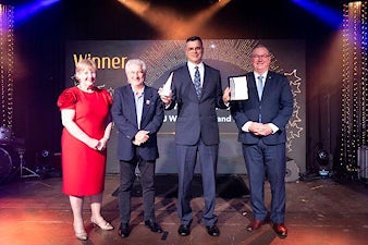 Dedicated businessman named Employee of the Year